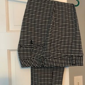 Black and white check pants.